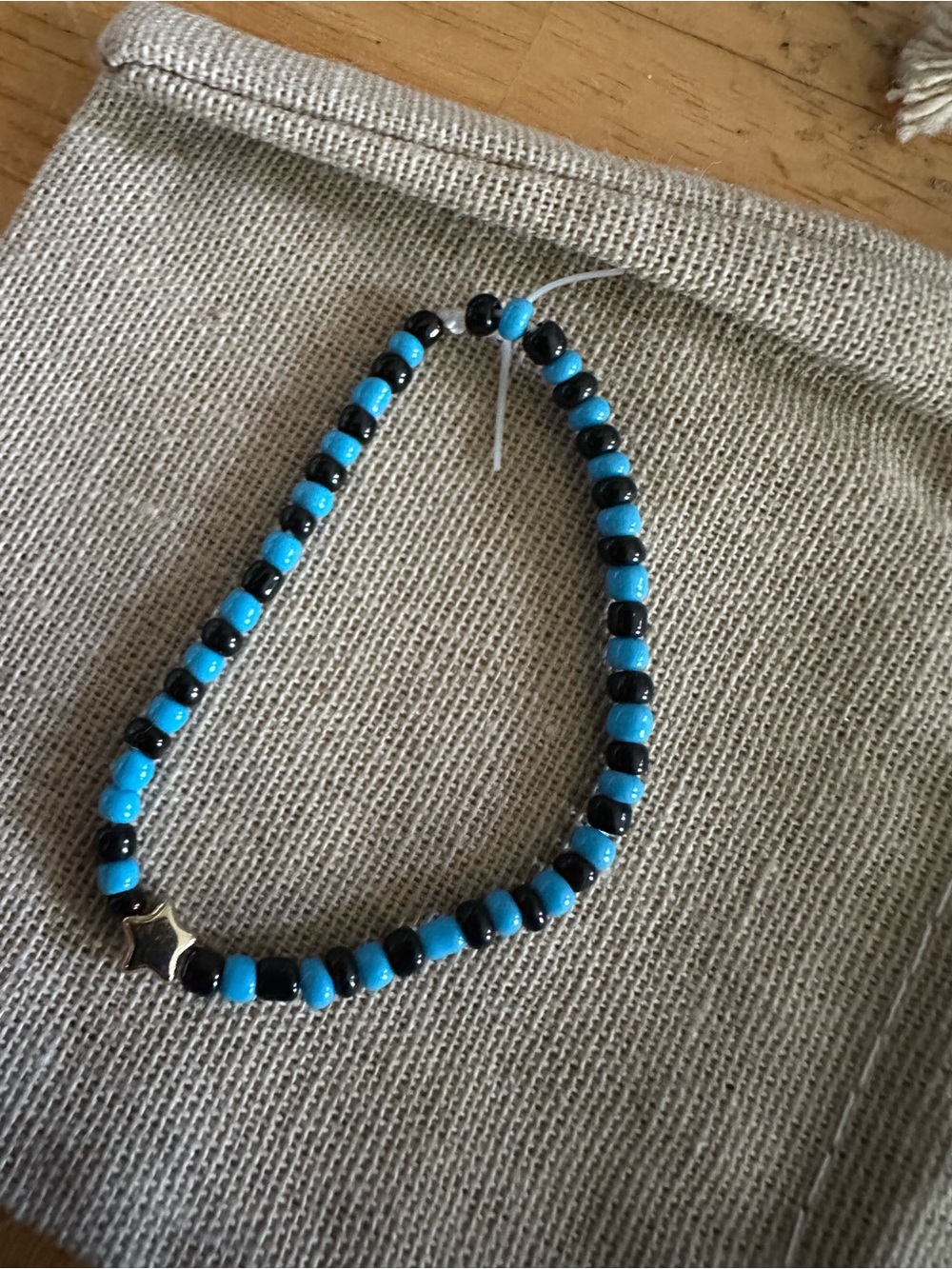 Turquoise and Black Beaded Bracelet with Star Accent